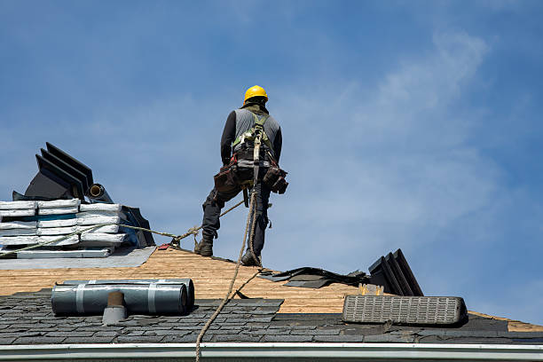 Professional Roofing technician working in Chelsea, MA